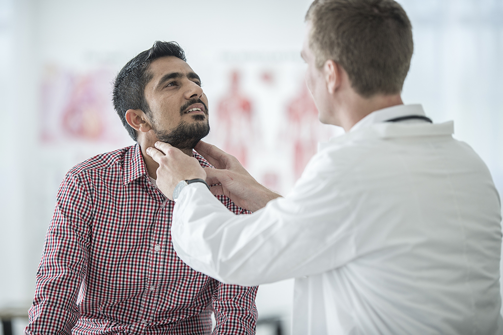 Medical Professional Checking the Patient's Lymph Nodes