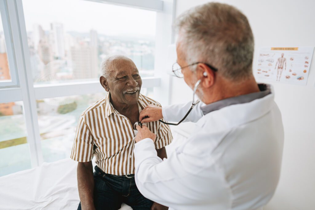 Doctor listening to a patient's heartbeat