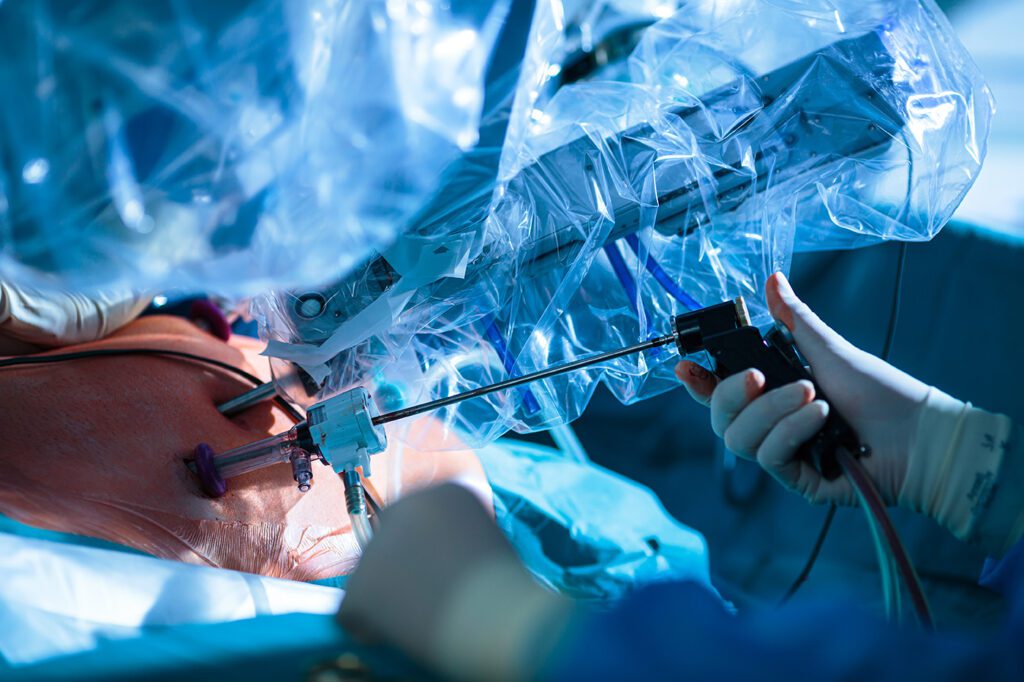 Provider performing robotic surgery