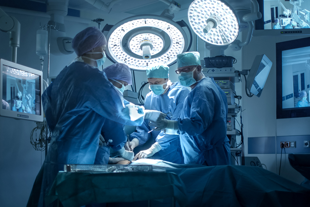 Medical Team Performing Surgical Operation in Modern Operating Room