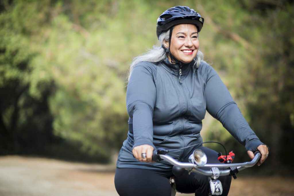 Woman riding a bike outside