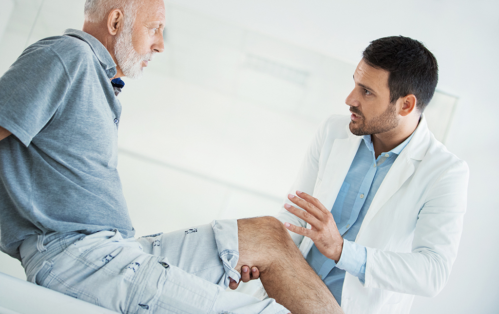 Senior man having medical exam.