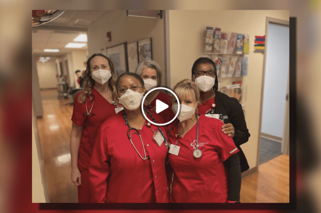 Diverse Female Medical Professionals wearing red