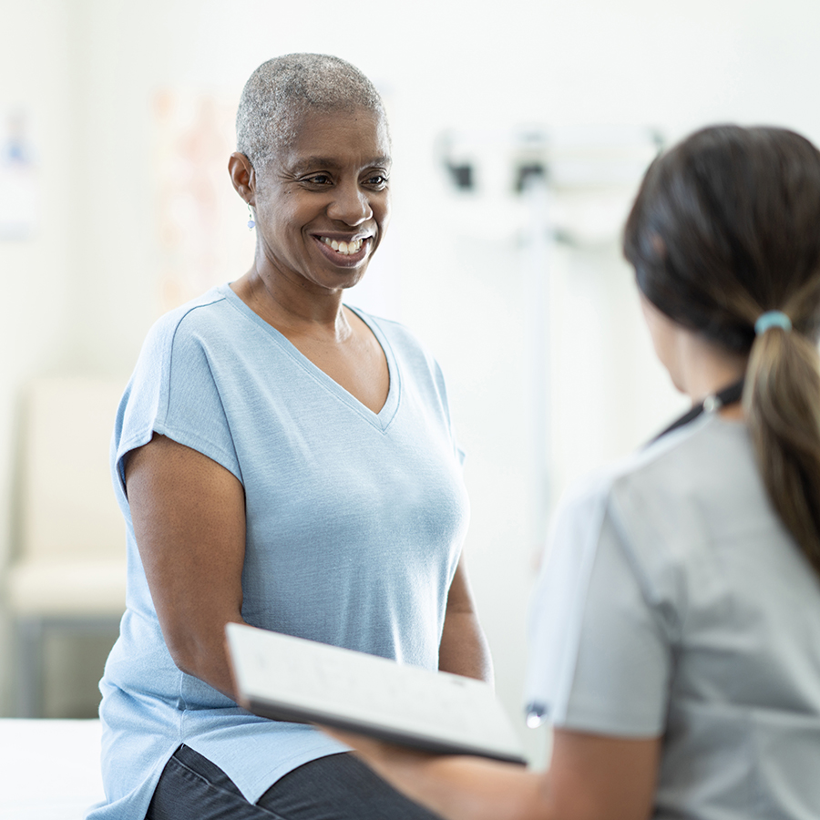 Woman meets with nurse