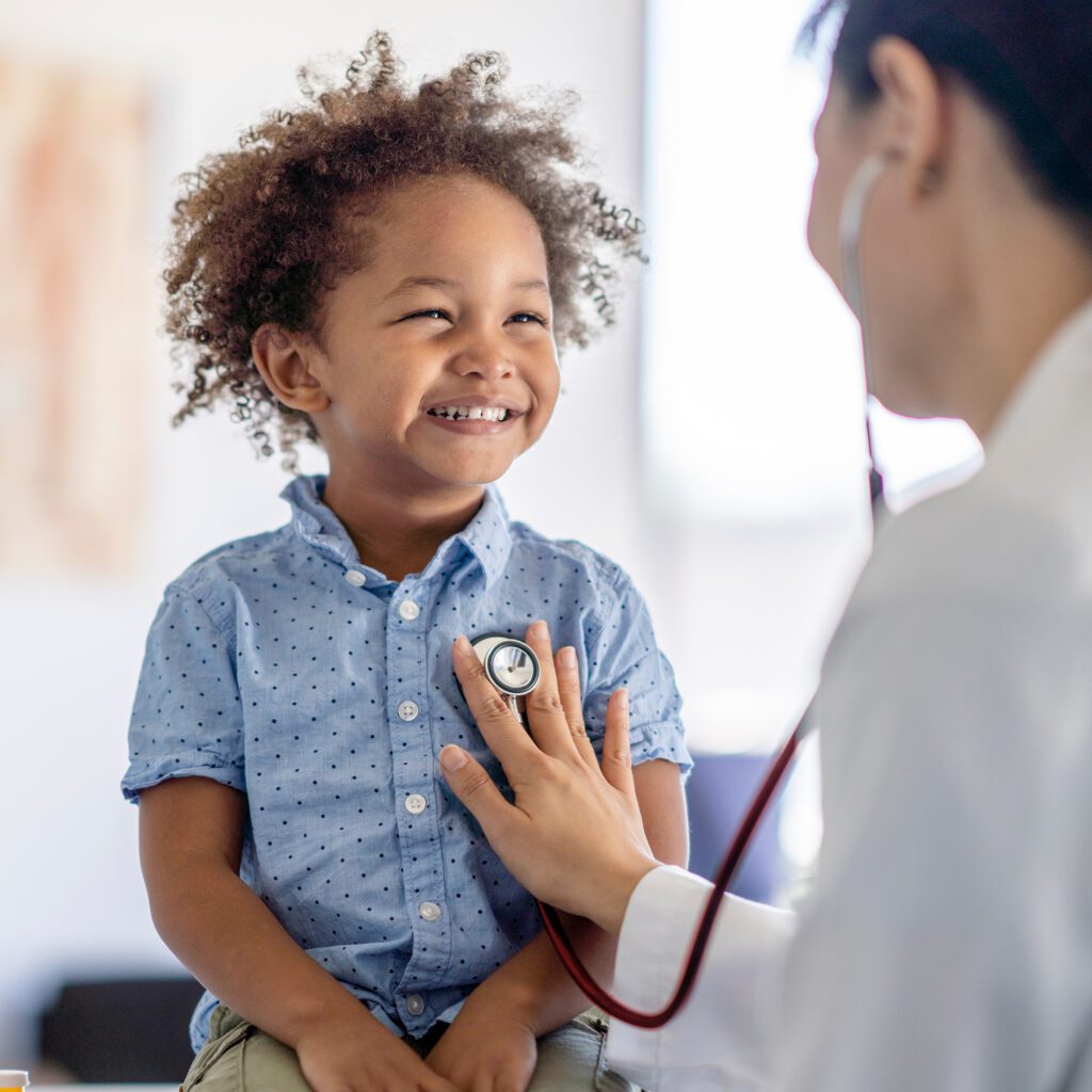 Young boy receives checkup