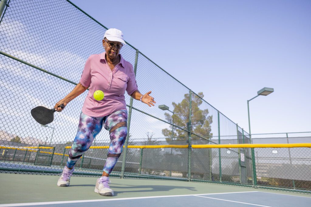 Woman playing pickleball