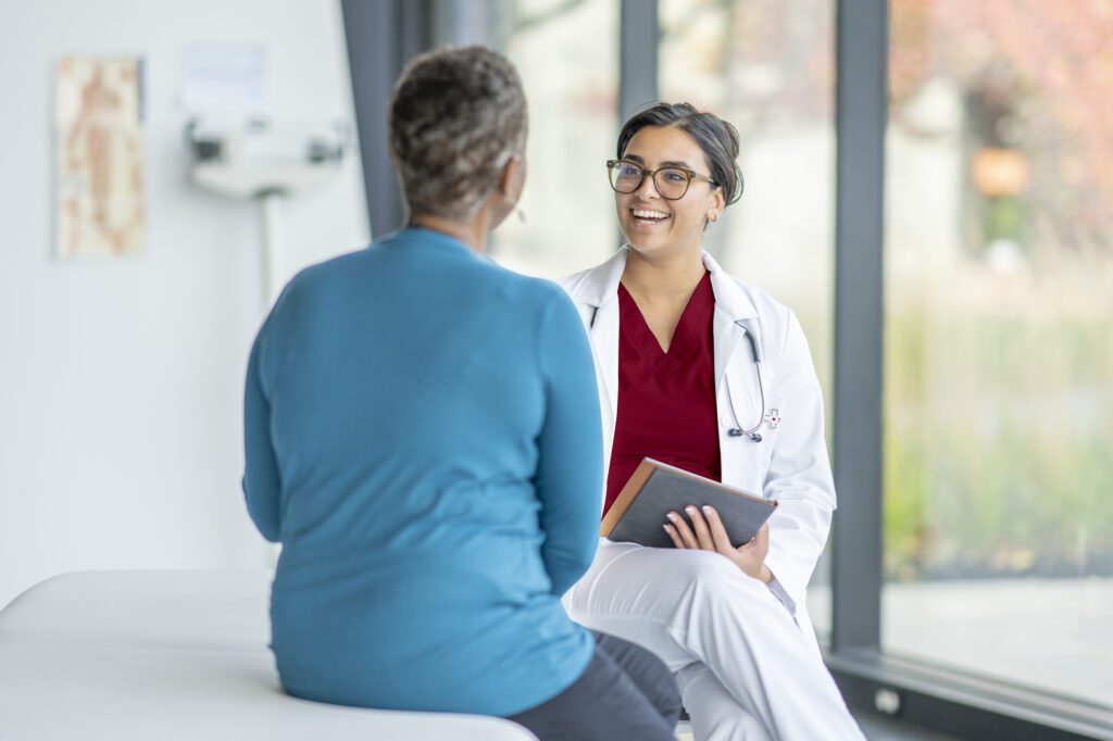 Doctor speaking with patient