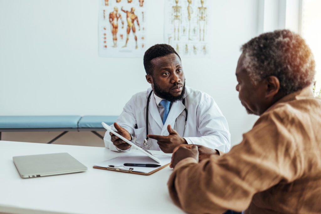 Doctor going over test results with patient