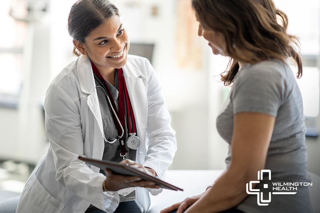 Doctor speaking with patient