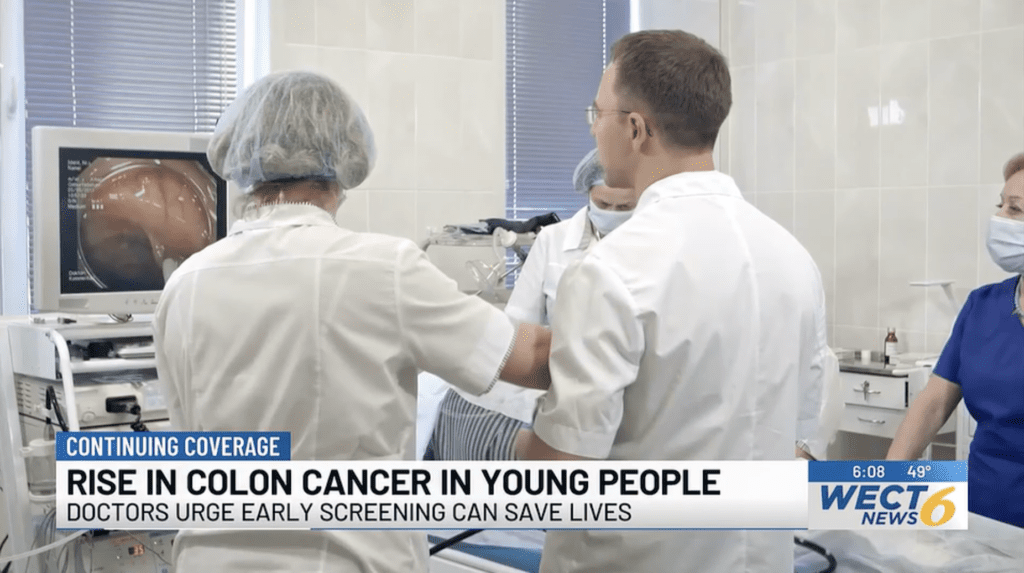 Doctors screening for colon cancer