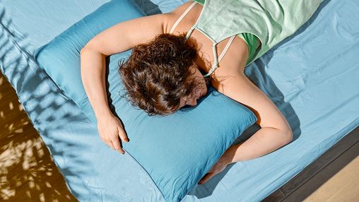 Woman sleeping on a pillow